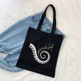 SHEIN A Black Fashionable Canvas Tote Bag For Women With A Trendy Music Series Spiral Piano & Music Note Print, Simple And Portable For Outdoor Shopping