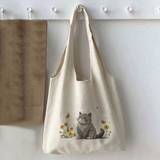 SHEIN A Fashionable Canvas Bag For Women, In Beige Color, Featuring A Cartoon Cat, Yellow Flowers And Butterfly Print. The Bag Is Designed As A Vest Tote, A