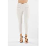 Metallic faux leather N.O.W.® trousers with a super-high criss-cross waist