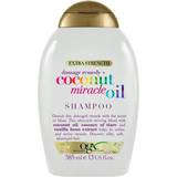 OGX Farvet hår Shampooer OGX Damage Remedy Coconut Miracle Oil Shampoo 385ml