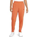 Nike Court Tennis Trousers Men - Hot Curry/White