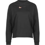 Nike Guld Overdele Nike T-shirt med lange ærmer og leopardprint firkantet pasform