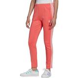 32 - Dame - Stribede Bukser & Shorts adidas Primeblue SST Track Pants