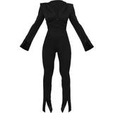 32 - V-udskæring Jumpsuits & Overalls PrettyLittleThing Split Hem Tie Waist Cut Out Blazer Jumpsuit - Black