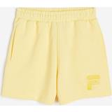 Bomuld - Dame - Gul Bukser & Shorts Fila BALVE high waist sweat pants Shorts Damer lys gul