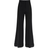 Moschino Dame Bukser & Shorts Moschino Flared Trousers In Stretch Cady
