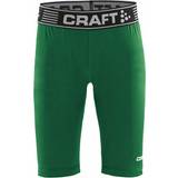 Craft Sportswear Grøn - M Bukser & Shorts Craft Sportswear Pro Control kompressionstights til børn, Team green
