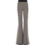 Balmain Dame Bukser & Shorts Balmain Flare pants in fine monogrammed mesh