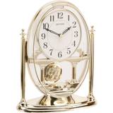 Brugskunst Rhythm Gold Oval Mantel Clock with Swinging Bordur