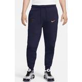 Blå - Fløjl Bukser & Shorts Nike Paris Saintgermain Tech Fleece