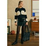 Urban Classics Elastan/Lycra/Spandex Nederdele Urban Classics Ladies’ faux-leather biker skirt Short skirt black