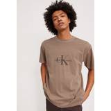 48 - Beige - Bomuld T-shirts & Toppe Calvin Klein Jeans Monologo T Shirt Brown