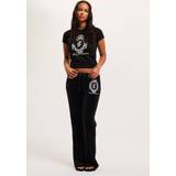 Juicy Couture Dame T-shirts & Toppe Juicy Couture T-Shirt Heritage Crest Tee JCWCT24337 Schwarz Slim Fit