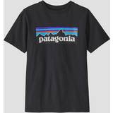 Patagonia Aftagelig hætte Børnetøj Patagonia Regenerative Organic Certified Cotton P- T-shirt ink black