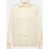 Gucci Dame Bluser Gucci Bow-detailed GG silk jacquard blouse beige