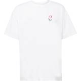 Converse Hvid Tøj Converse Hvid T-shirt med stjerneformet chevron-blomst
