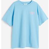 H&M 48 - Blå Tøj H&M Dame Blå T-shirt med tryk