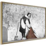Guld - Papir Vægdekorationer Artgeist med ramme Banksy: Sweep it Under the Carpet Plakat