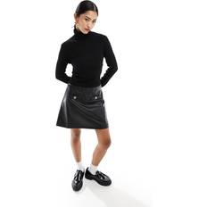 Morgan Dame Kjoler Morgan – Svart 2-i-1-klänning med stickad polotröja och minikjol läderimitation-Svart/a