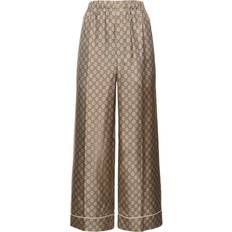 Gucci Brun Bukser Gucci GG Supreme wide-leg silk pants brown
