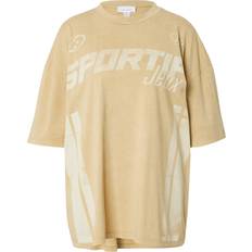 Topshop Cold Shoulder Tøj Topshop Beige oversized t-shirt med 'sportif'-grafik-Neutral