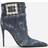 Dolce & Gabbana Patchwork denim ankle boots with rhinestone buckle